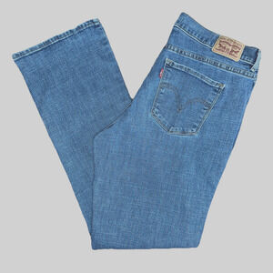 Womens LEVI’S Sz 12 Classic Boot Cut Jeans Stretch Mid Rise 31” Ins Medium Wash